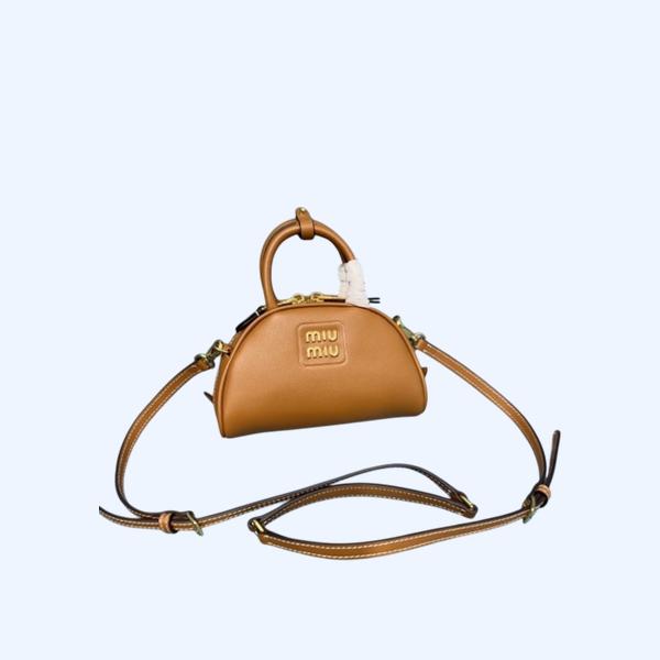 [ 미우미우 ] 가죽 탑 핸들 백 레더 토트백