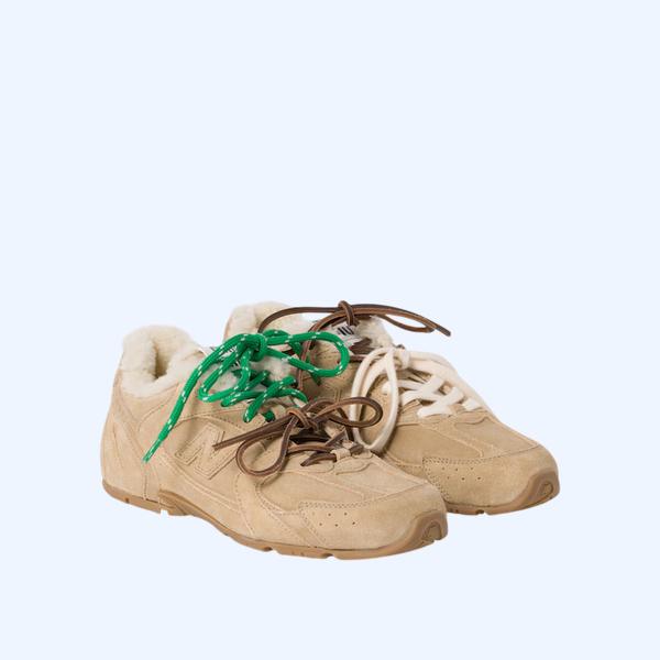 New Balance X Miu Miu 530 SL 블리치드 가죽 스니커즈